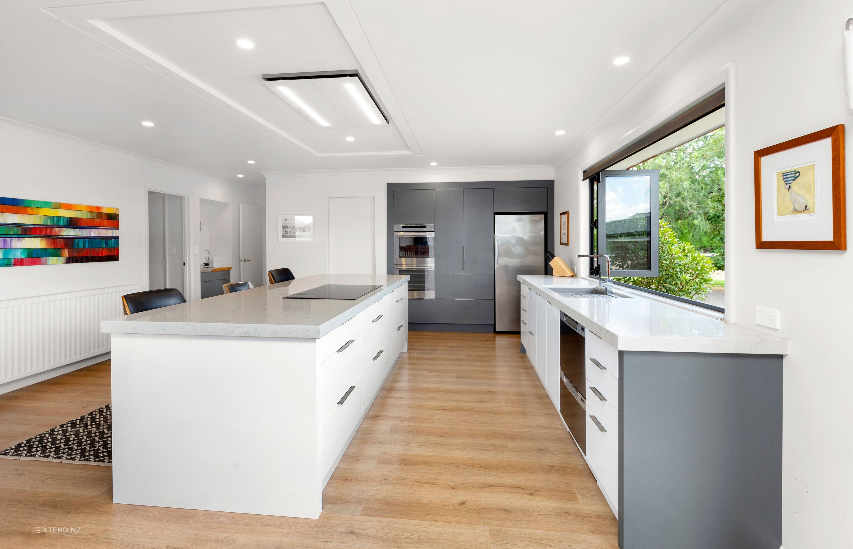 The open-plan kitchen has space to cook and entertain, with room for the whole family to gather and be together.