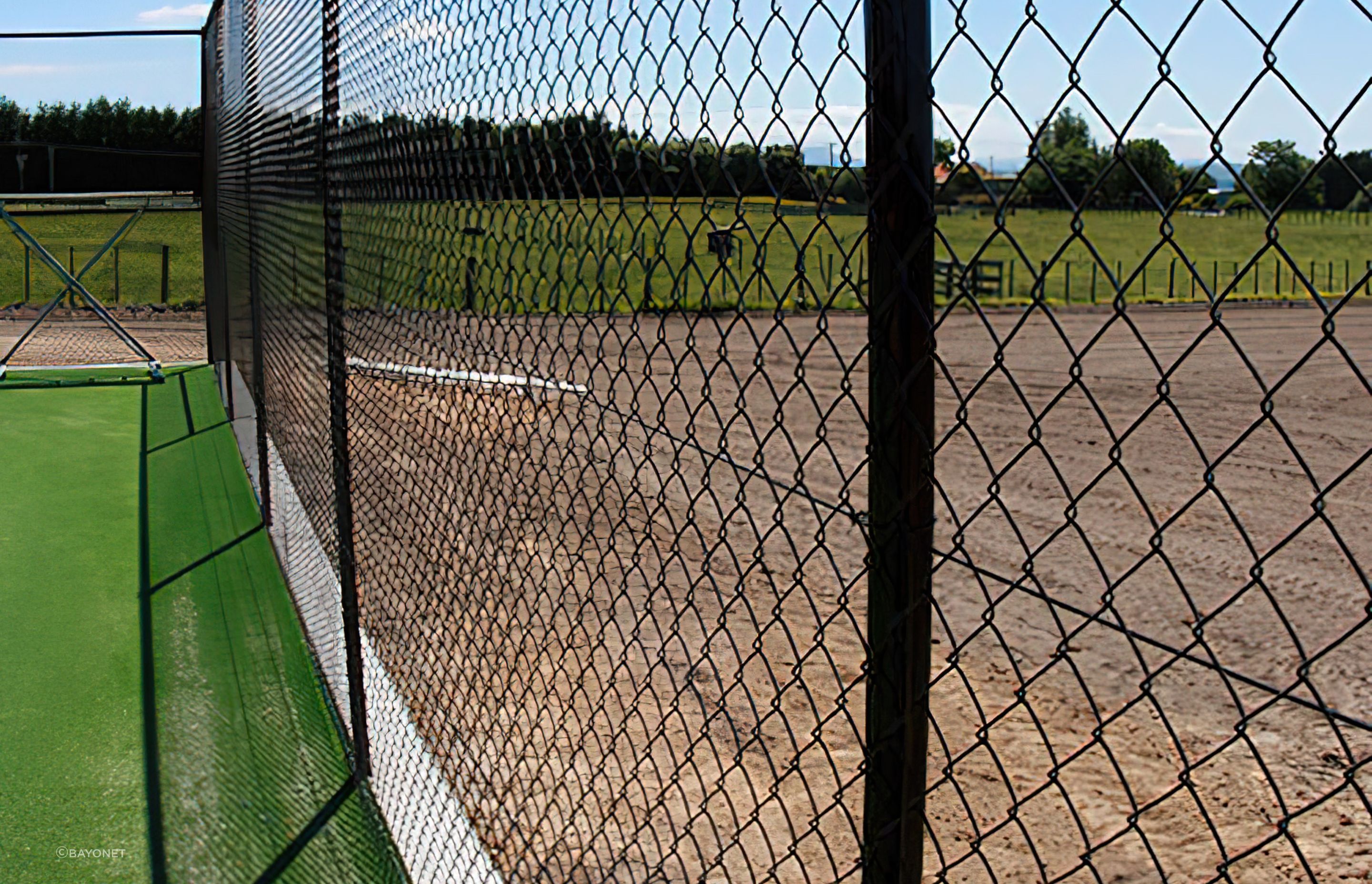 Functional but highly effective, there are plenty of applications for chain link fencing, seen here featuring Bayonet Chain Link Netting.