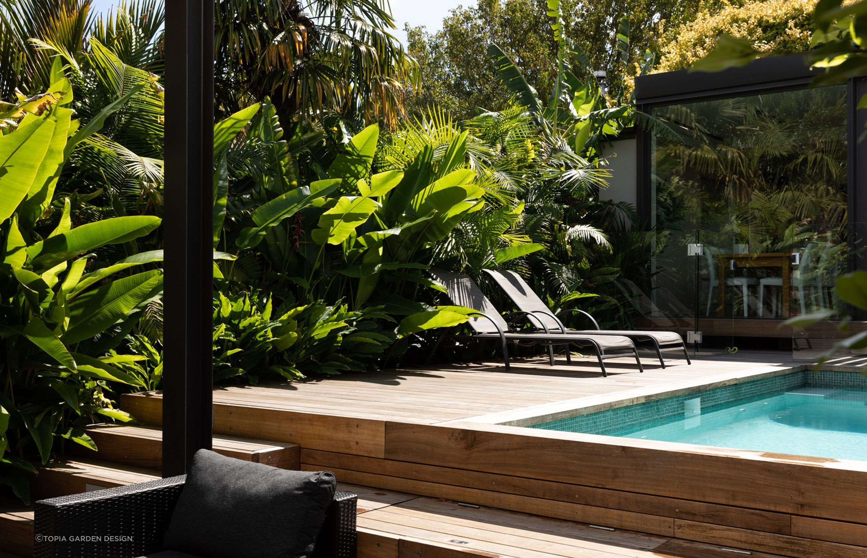 Picking plants that will prosper in your climate is fundamental to success, seen here in this stylish outdoor space in sub-tropical Auckland.