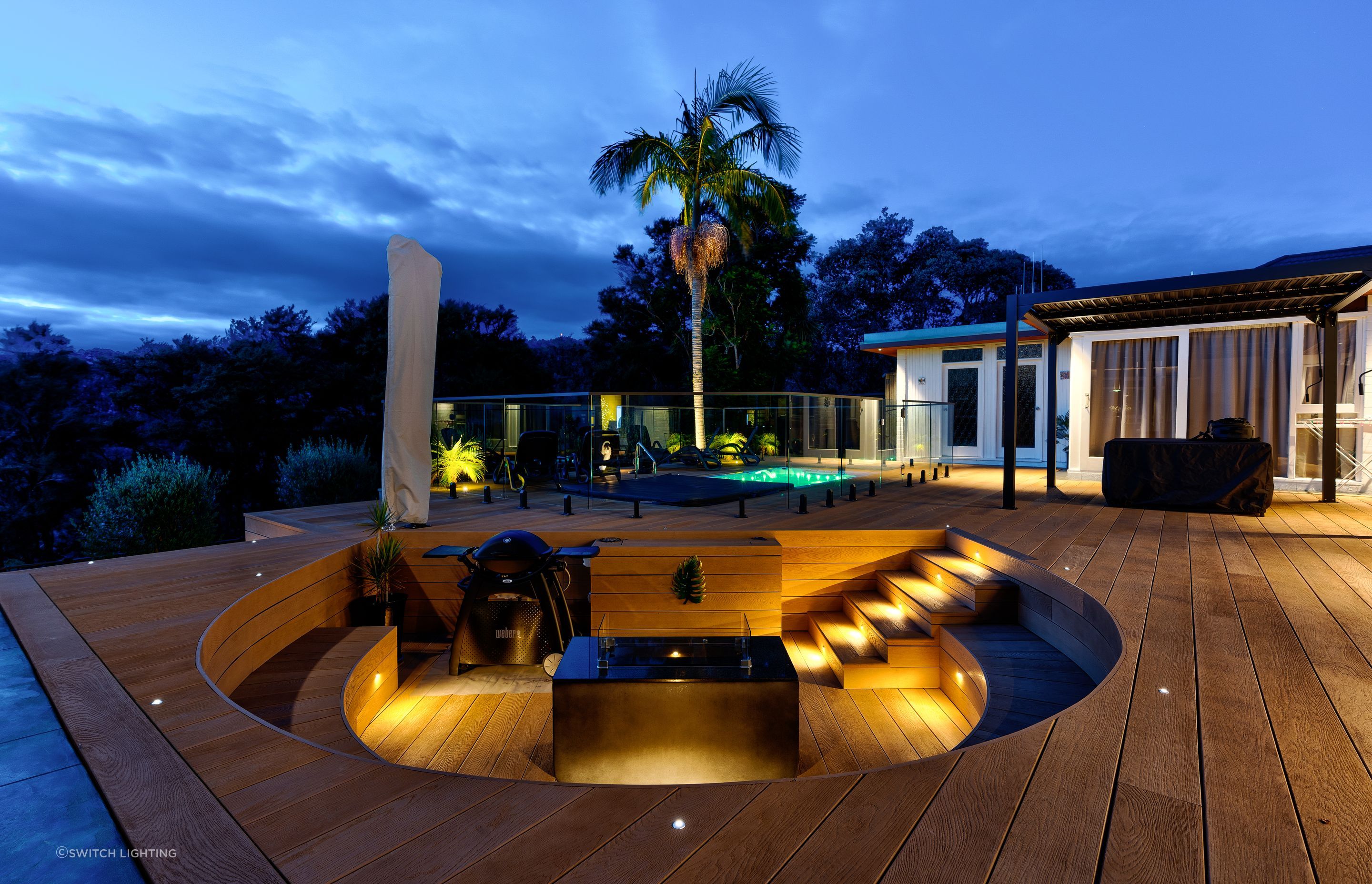 Switch Lighting Mini-LIGHTZ create an inviting atmosphere in this outdoor entertainment area.