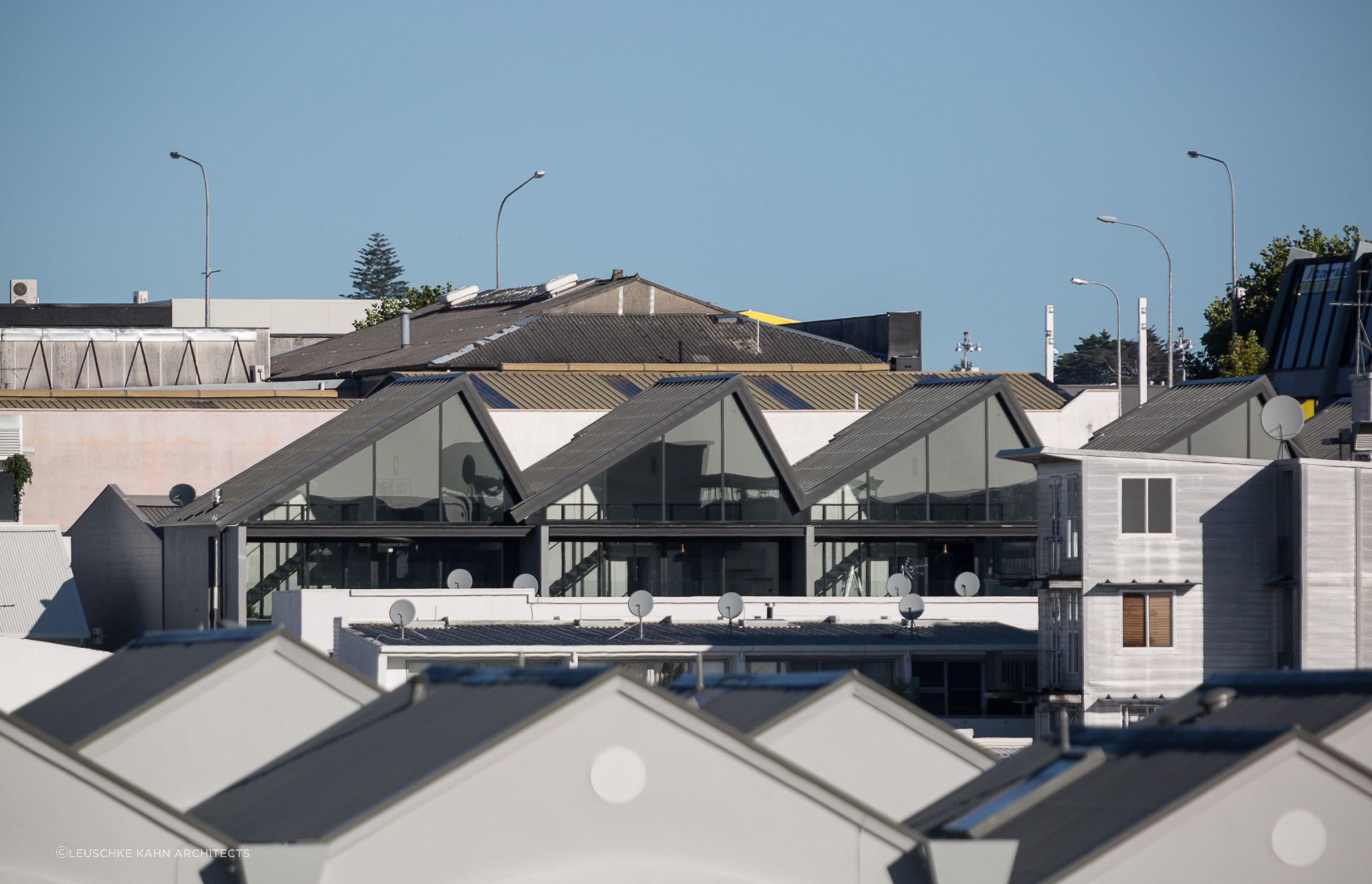 The tips of five terraced houses offer views for all over Grey Lynn in Auckland.