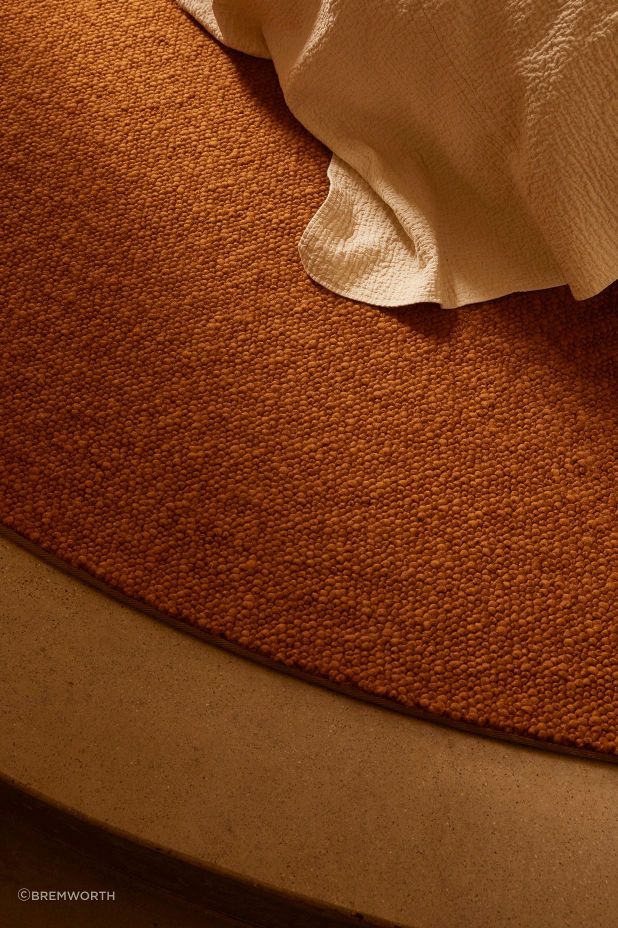 Edging options include overlocked, concealed, and fabric, available on rectangle, square, and round-shaped rugs.