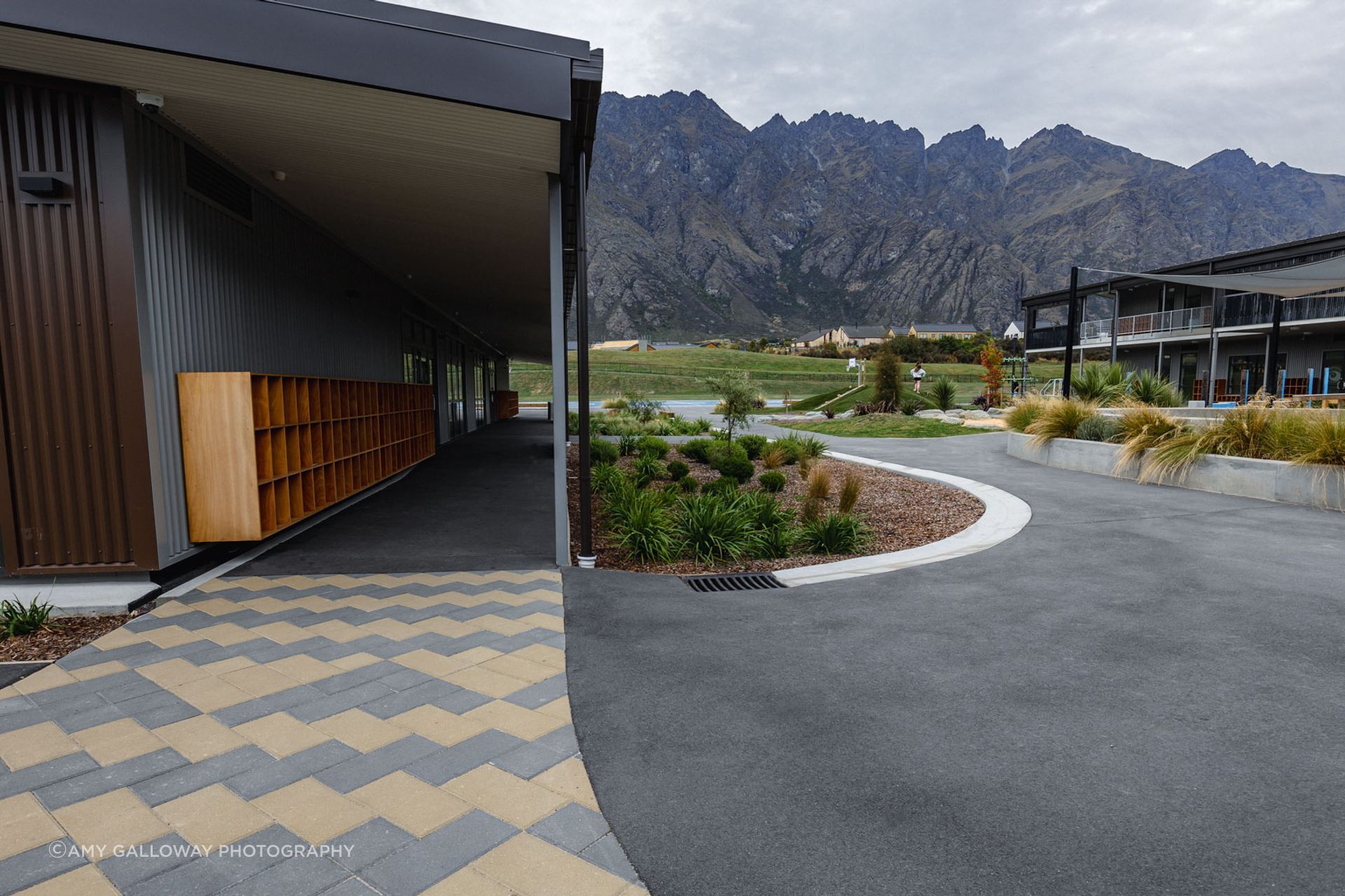 Paving, planting, and tall timber Pou have been used as wayfinding elements.