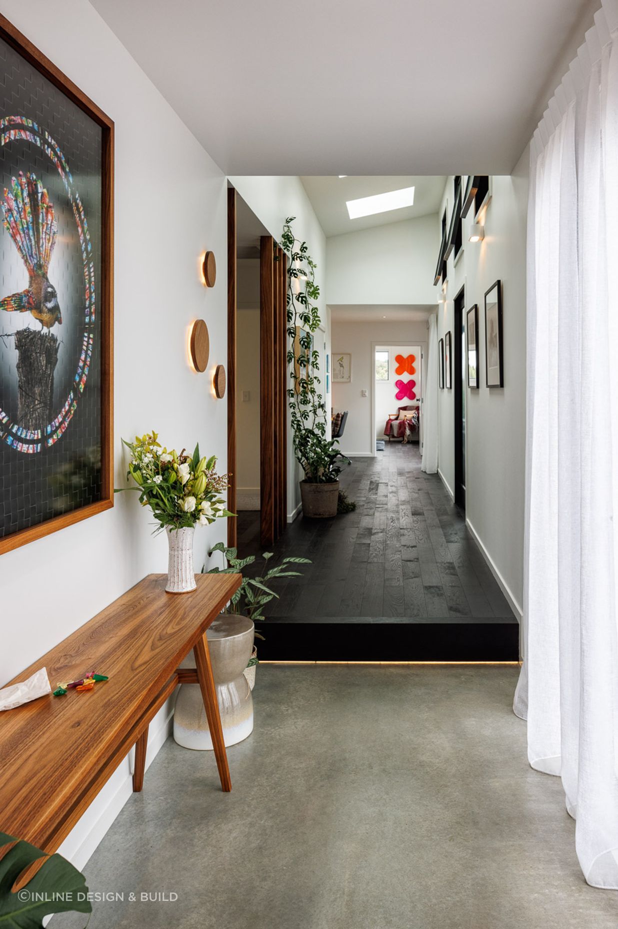 A spacious hallway doubles as a gallery.