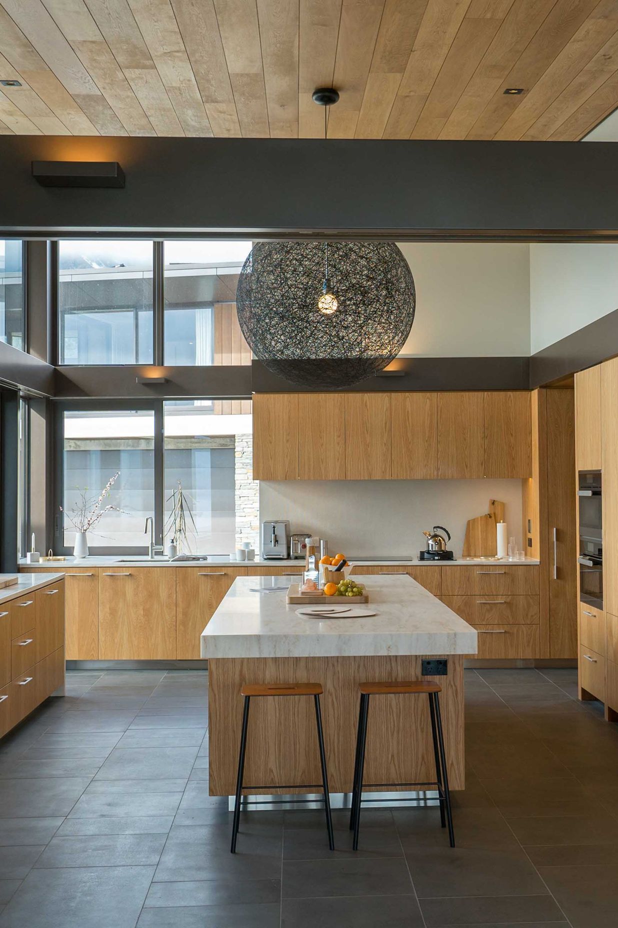 The kitchen overlooks a central courtyard. Photograph: ArchiPro.