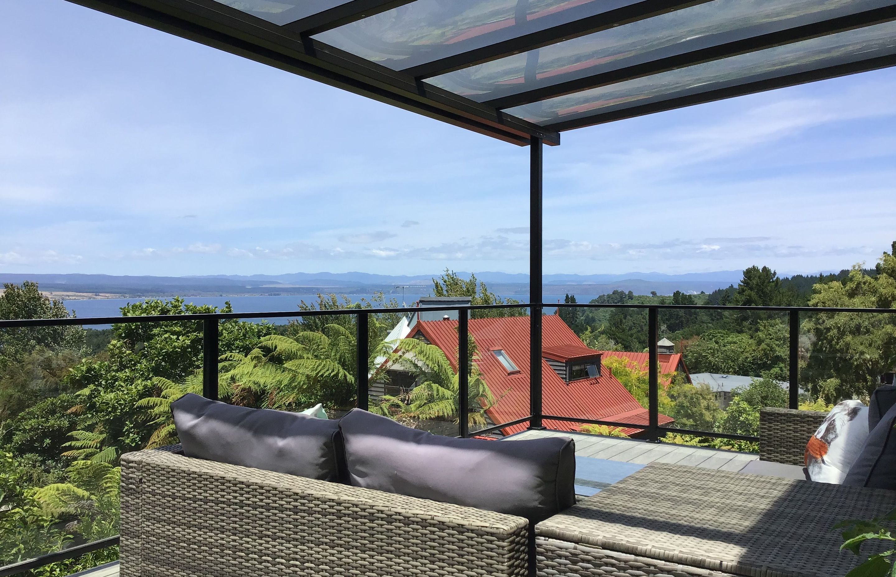 Covered deck off living room overlooking Lake Taupo