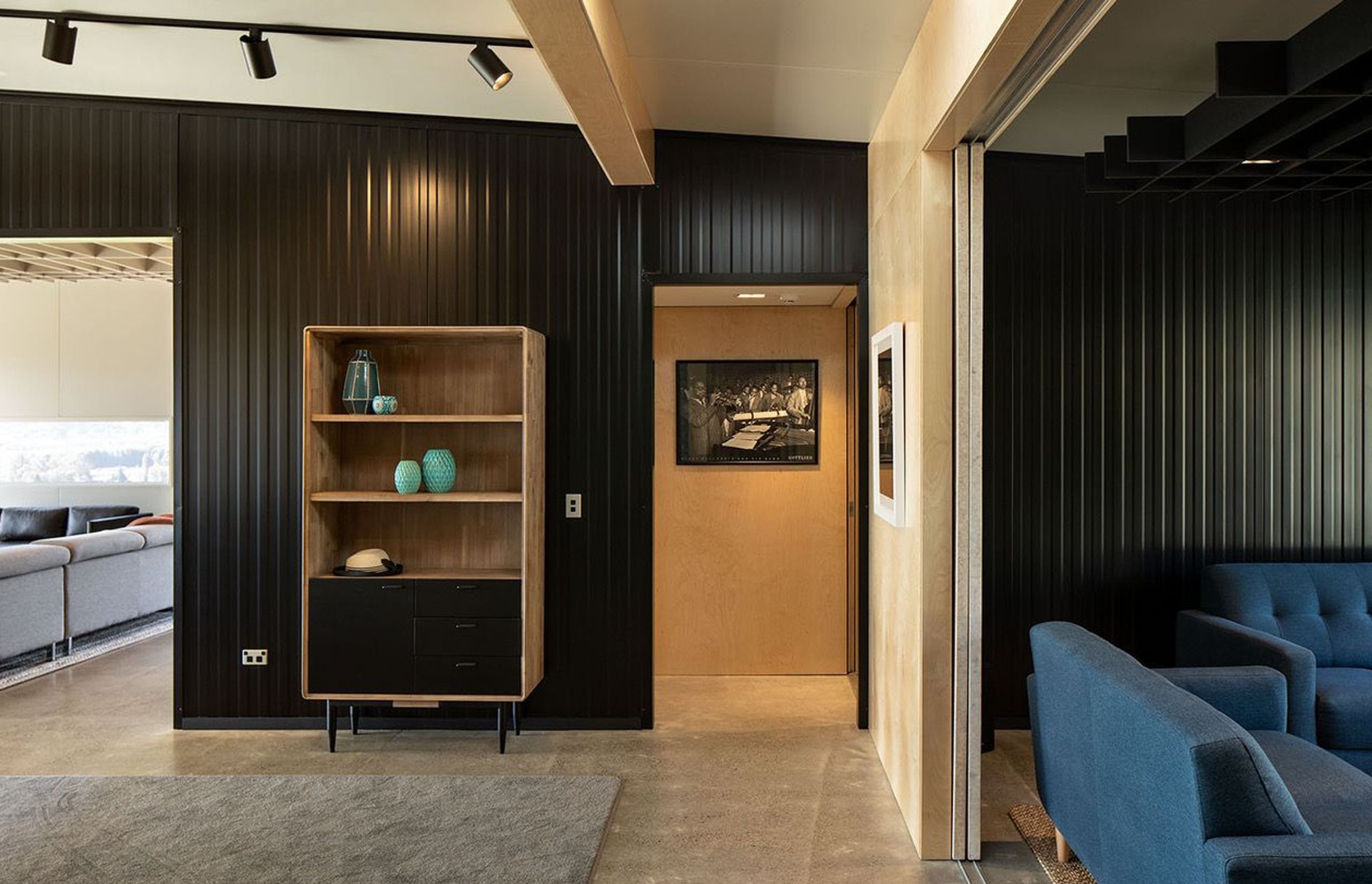 Prefabricated Metalcraft panels are a key feature of the house, making up both the internal walls as well as the exterior cladding. Photograph: Simon Devitt.