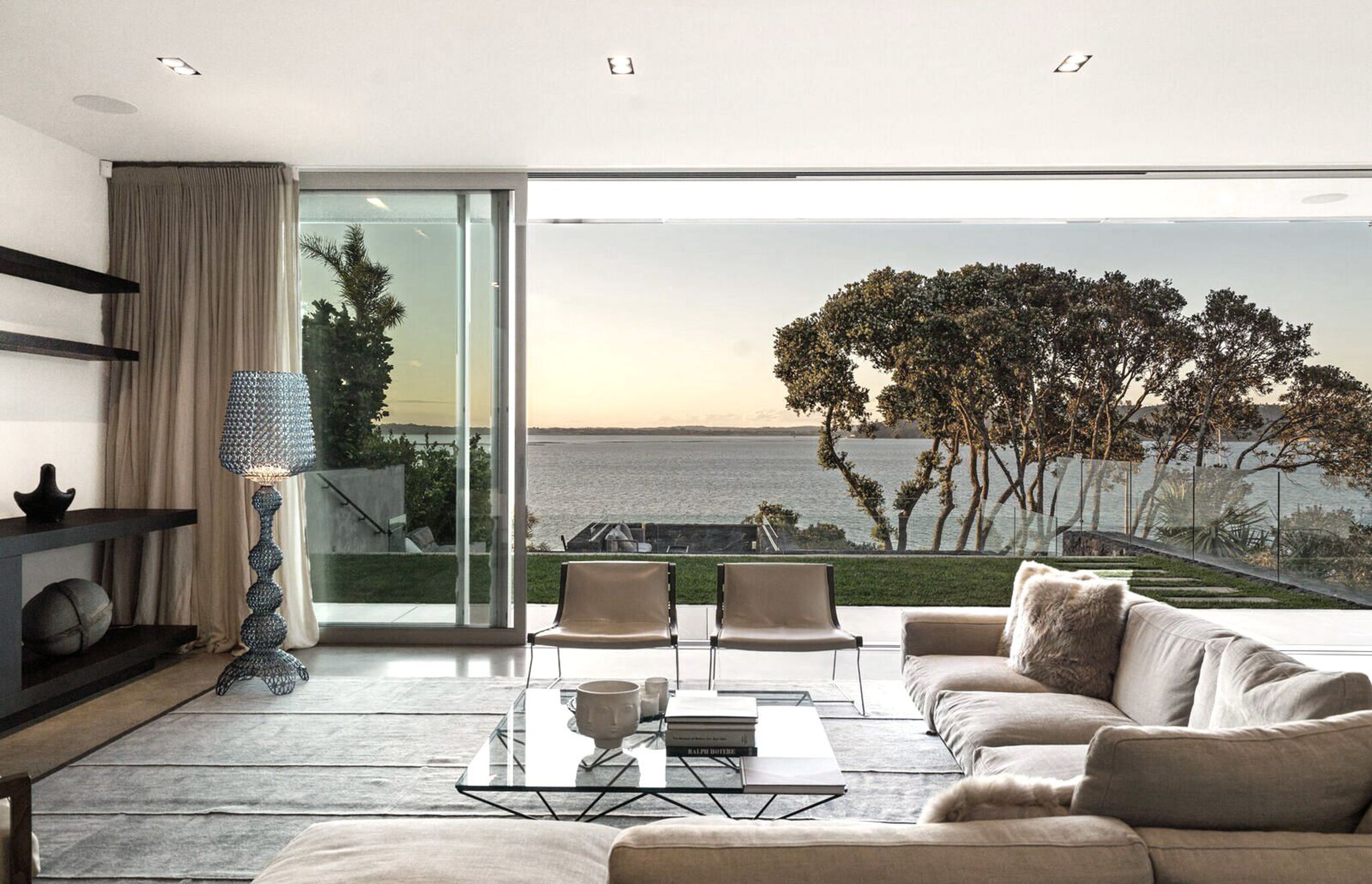  Floor-to-ceiling height windows and doors make the most of the views.