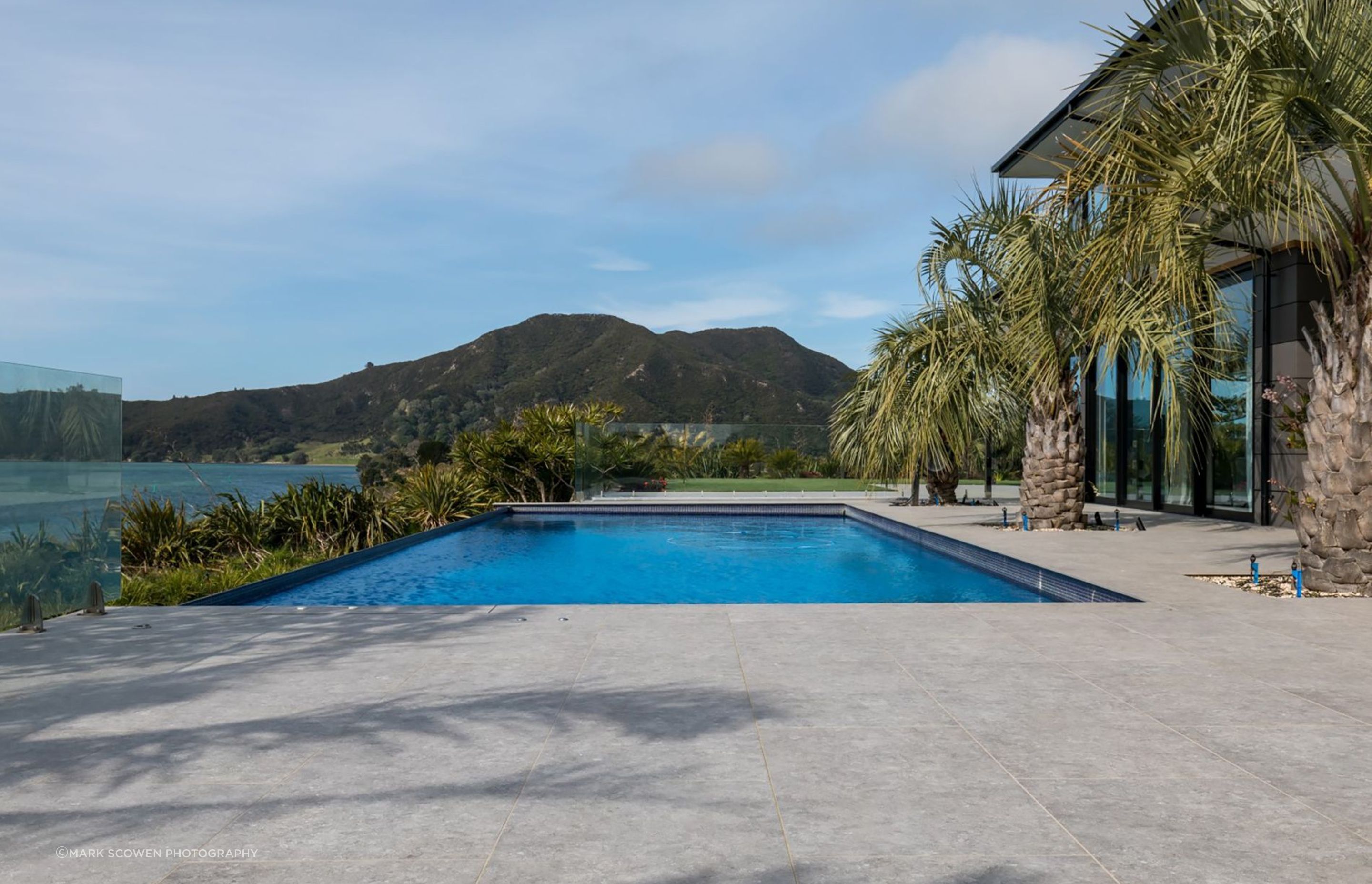 A view from the swimming pool area looking at Tohoraha (otherwise known as Mt Camel or Mt Houhora), a 236m-tall hill that Kupe mistook for a whale, according to Māori legend.