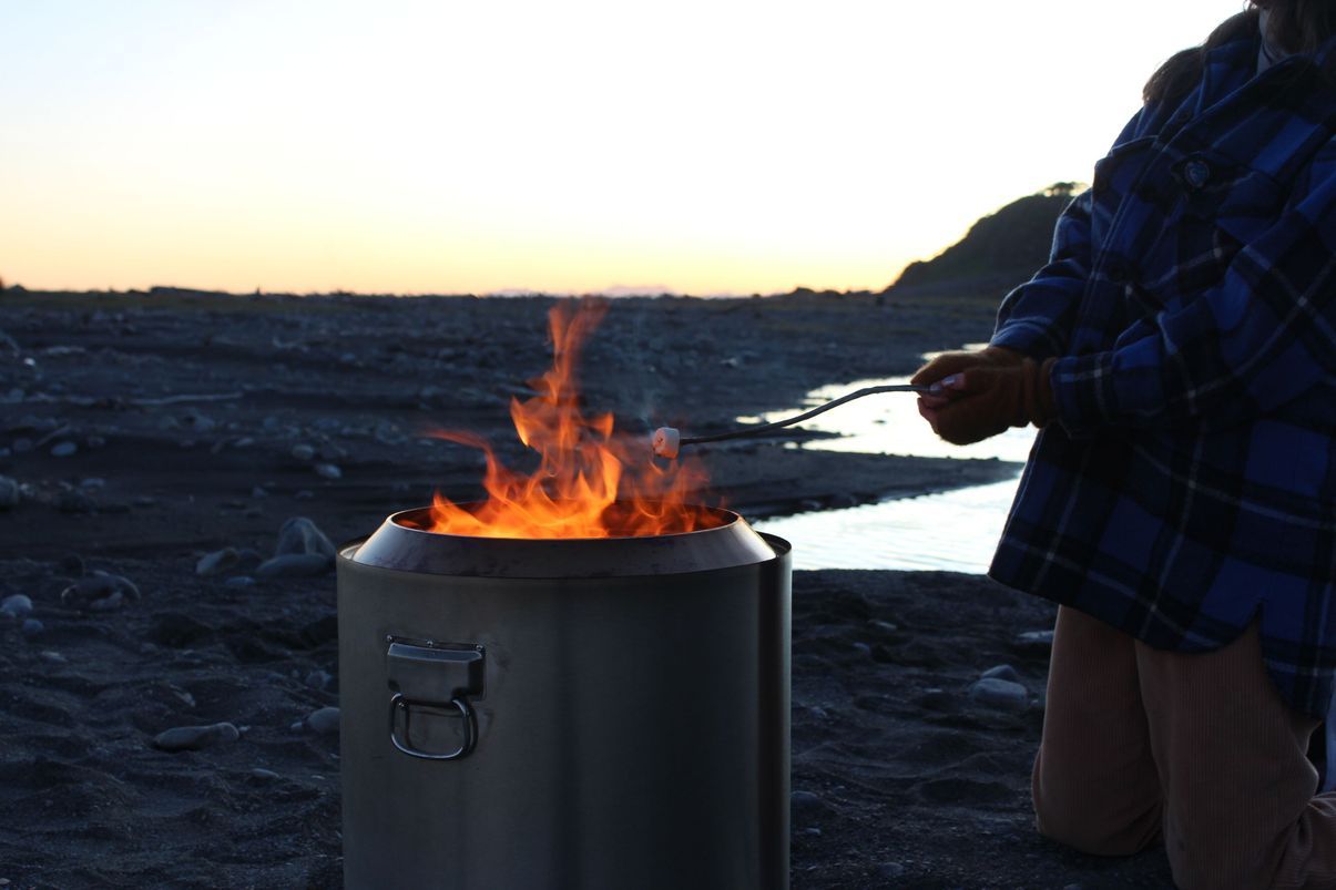 Wizard Fire Pit Roasting Marshmellow on Beach