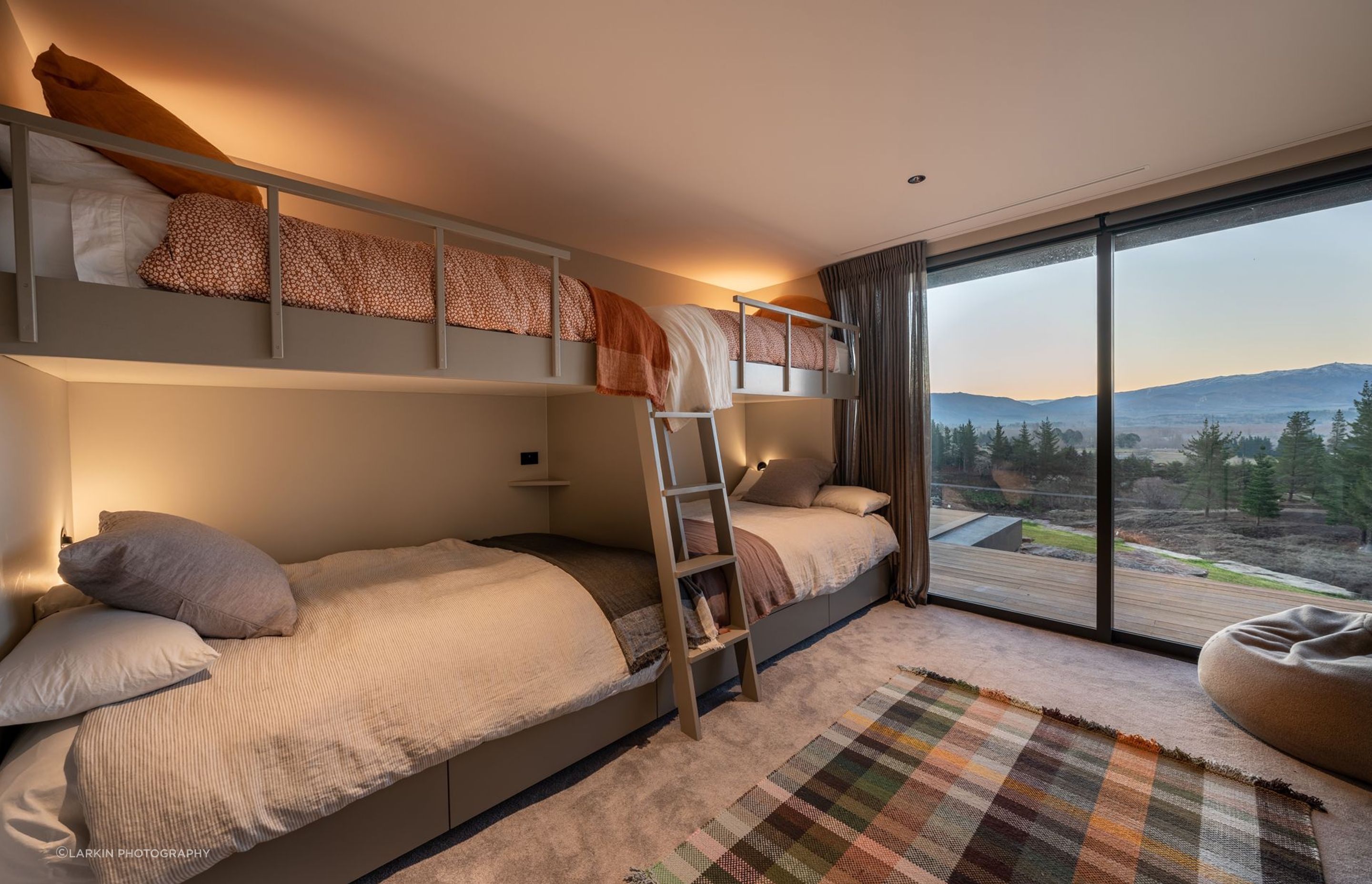 In the guest/family wing, a sumptuous bunkroom is perfect for the kids to pile into.