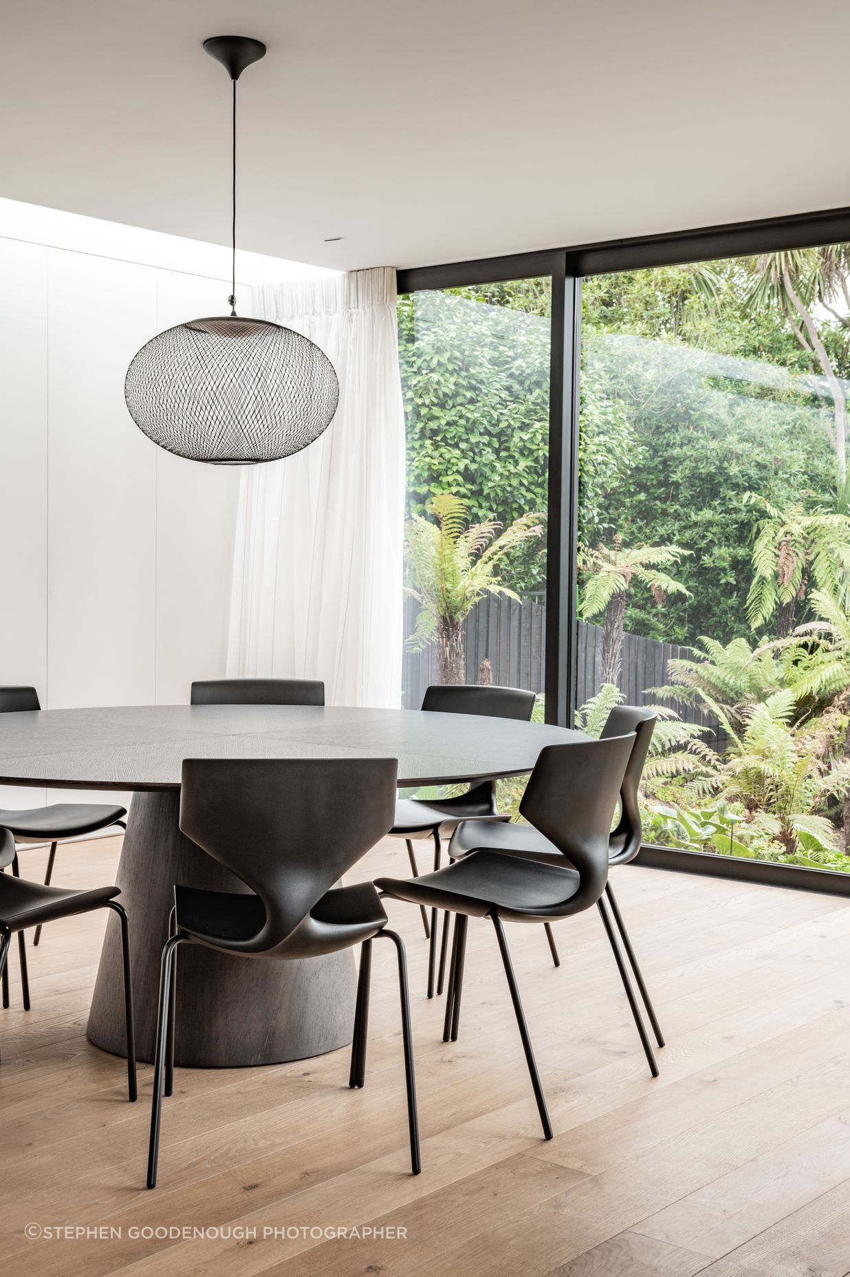 The dining area connects to the outdoors with a view to the stream at the bottom of the garden. “The key motivator is all about filling the house with light, because it hasn't got that direct northern orientation.”