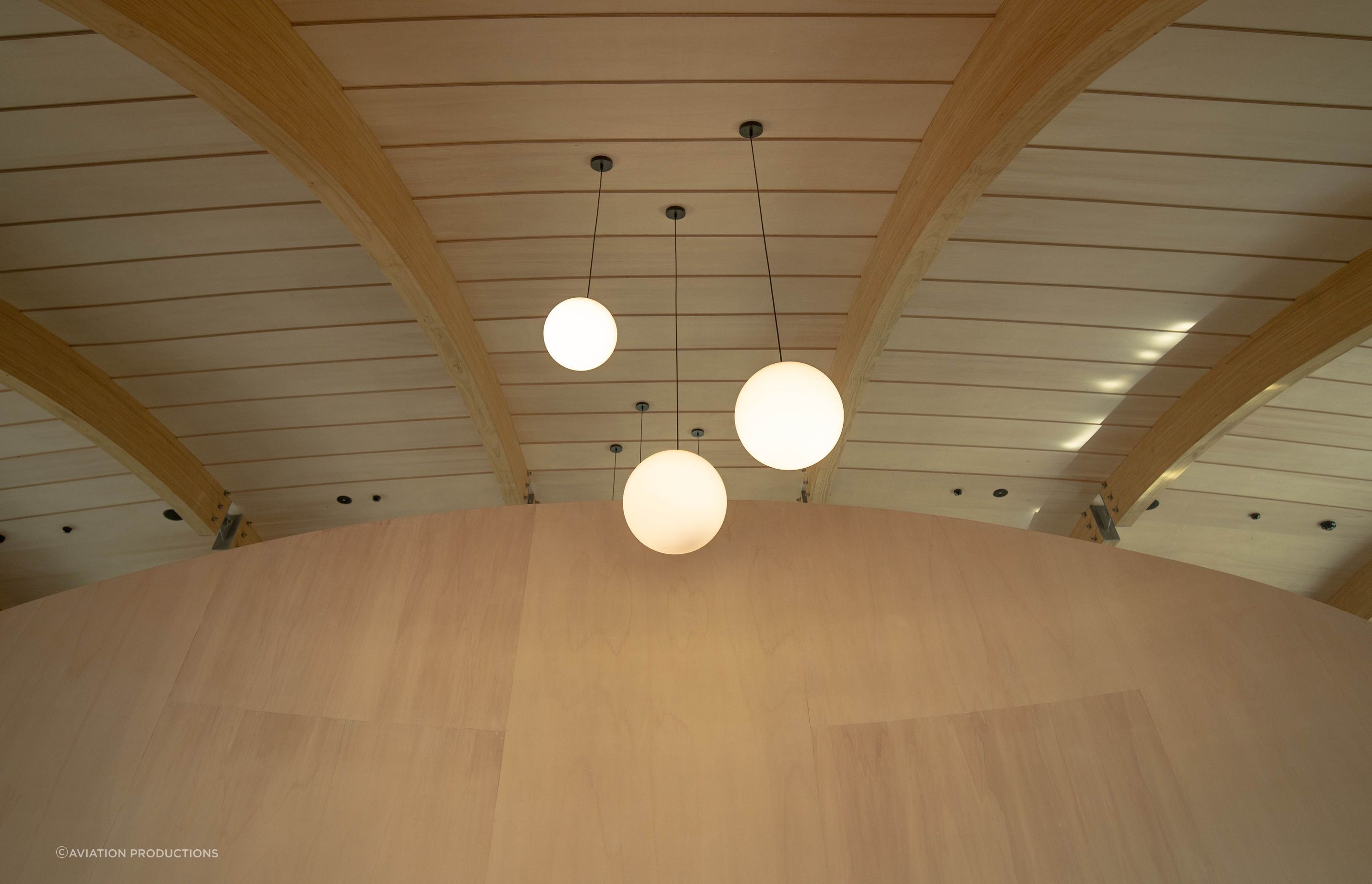 The plywood interior creates a warm and enveloping space.