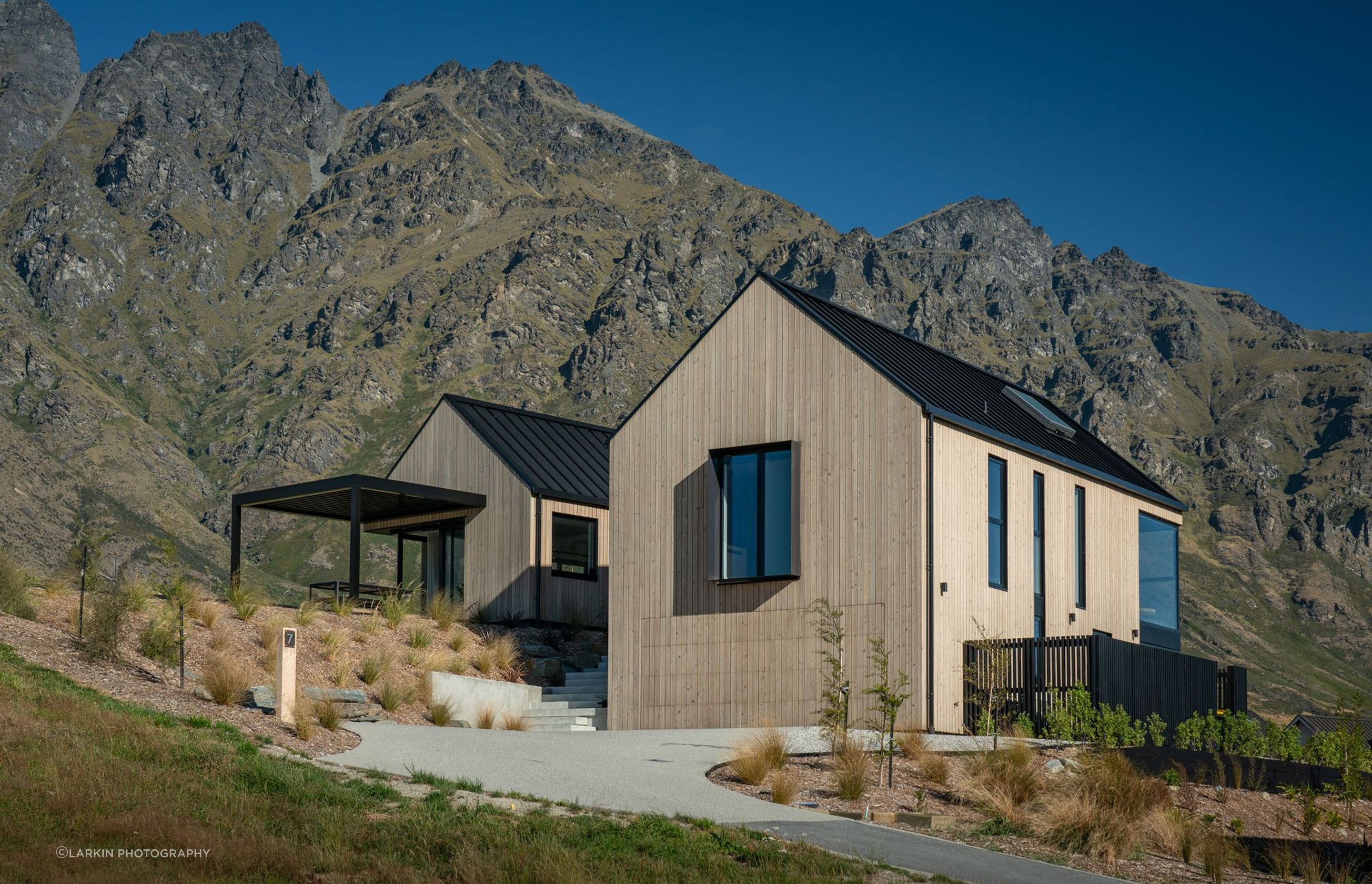 The Remarkables provide a magnificent backdrop to the home, whose gable roof profiles immitate the ridges of the mountains.