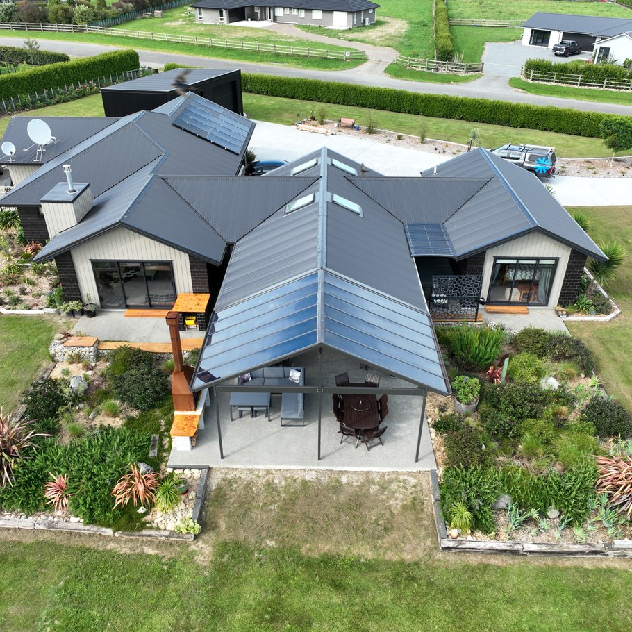 Archgola’s new gable profile creates a seamless transition between roof and canopy for this Ashburton home